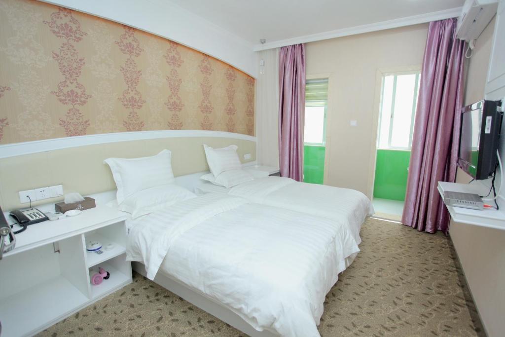 Xinghe Xinfeng Hotel Cantón Habitación foto